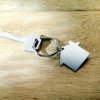 Metalen sleutelhanger huis